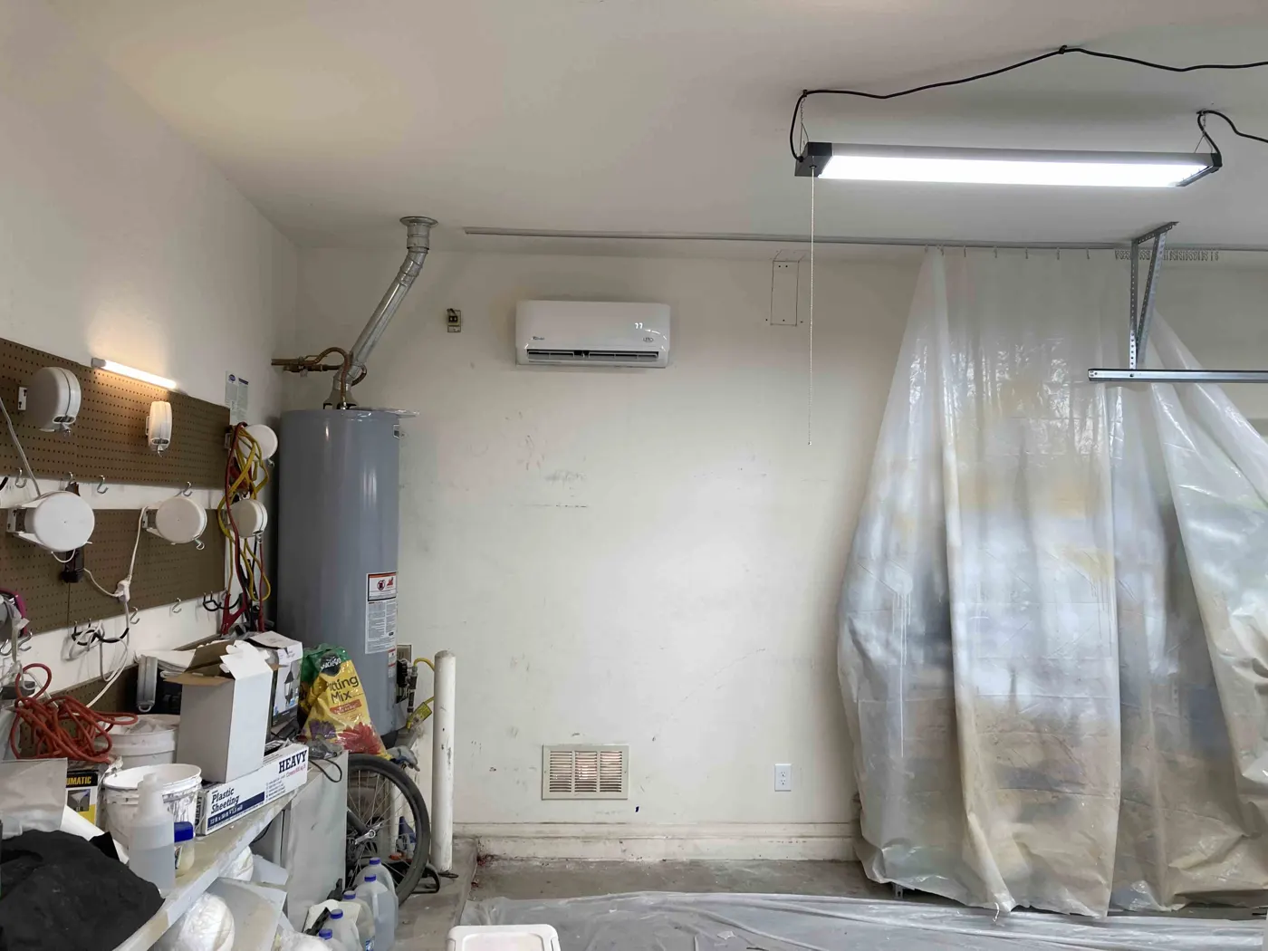Wall mounted mini split installed in a garage space